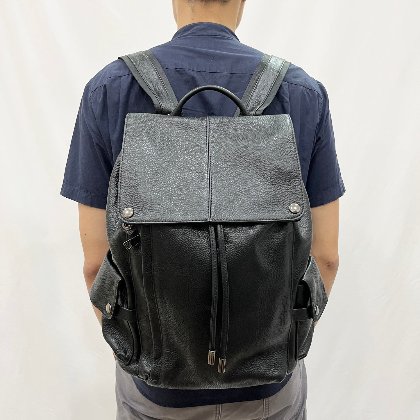 Drawstring flap design genuine cowhide leather backpack