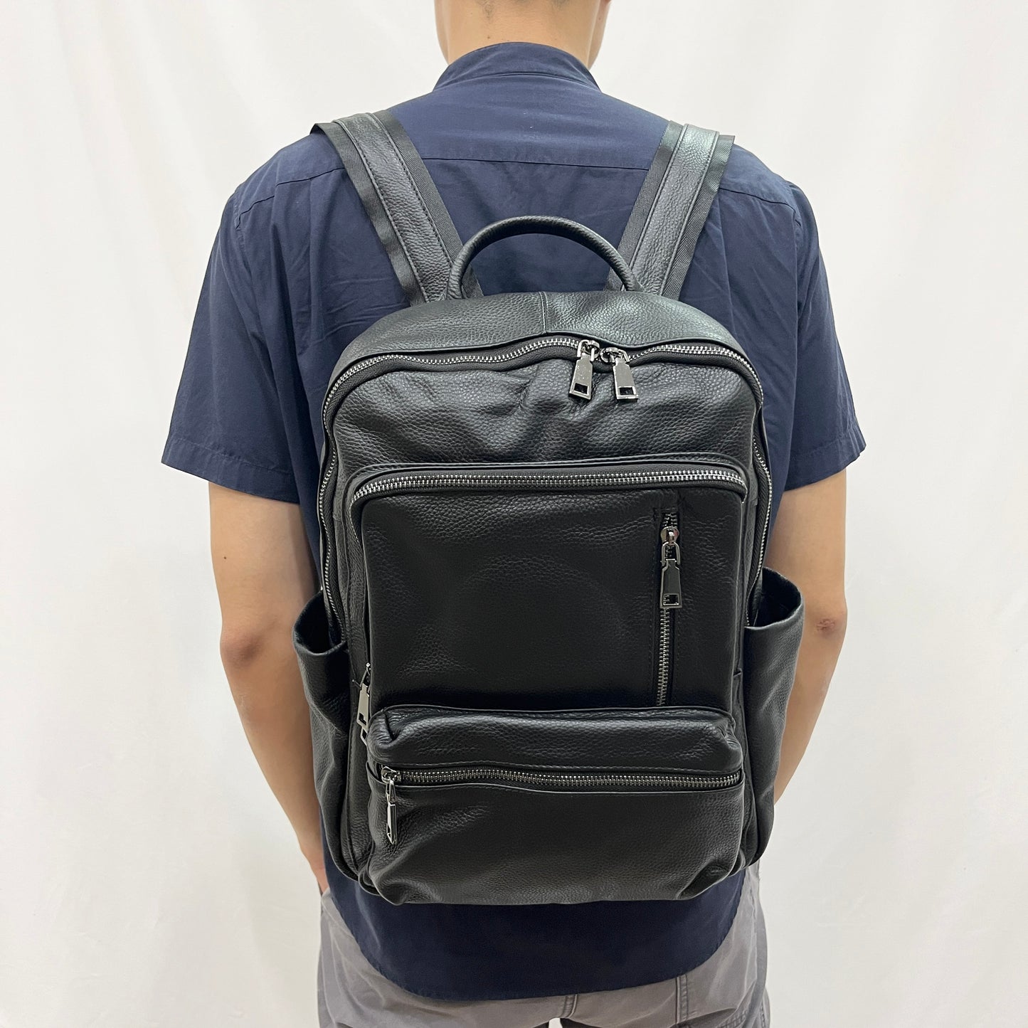 Multi zip design genuine cowhide leather backpack