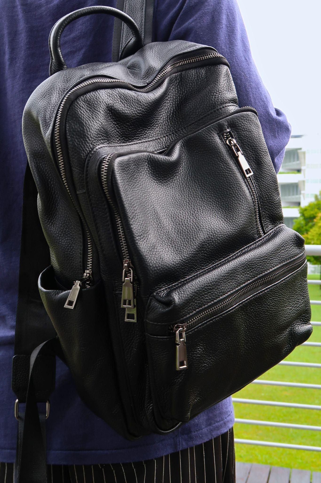 Multi zip design genuine cowhide leather backpack