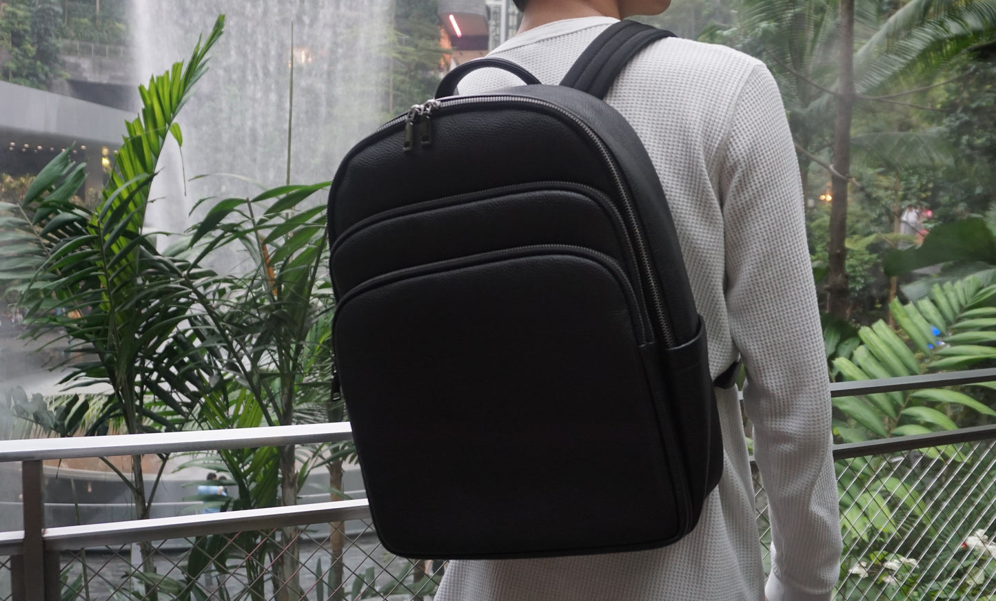 Crescent design genuine cowhide leather backpack with luggage/trolley sleeve
