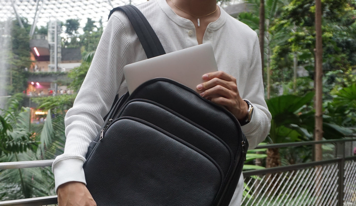 Crescent design genuine cowhide leather backpack with luggage/trolley sleeve