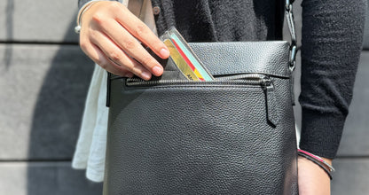 Multi zip design genuine cowhide leather sling bag